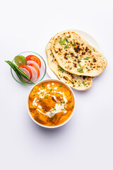 Tasty butter chicken curry or Murg Makhanwala or masala dish from Indian cuisine