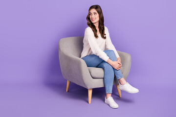 Photo of pretty lady wear stylish clothes sitting chair look empty blank space sale discount banner isolated on purple color background