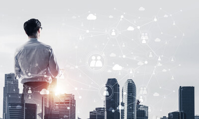 Concept of business success and control with confident boss against cityscape background