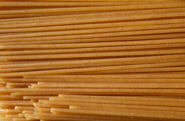 Fondo con detalle y textura de multitud de espaguetti en tonos marrones