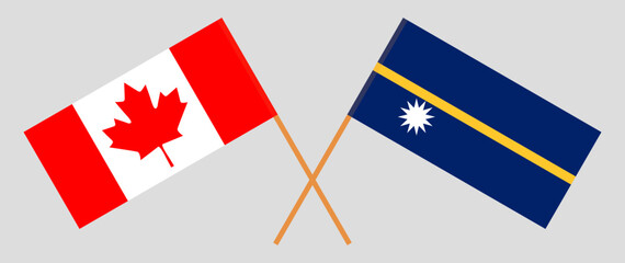 Crossed flags of Canada and Nauru. Official colors. Correct proportion