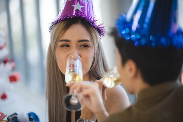 Two Asian young people cute couple husband guy wife lady drink hot beverage x-mas eve spend time magic land newyear, Christmas celebrate in romantic love together with family, happy holiday concept