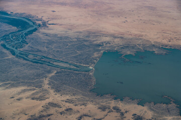 Aerial Landscape view of area around the Merowe Dam in norther Sudan, located at Nile river surrounded by desert