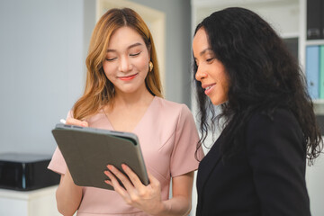 Serious diverse business team leader discuss financial paperwork, Smart businessman and businesswoman partner teamwork talking discussion in group meeting at office table in modern office interior