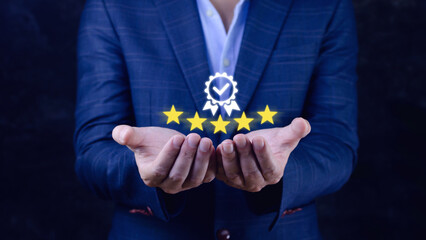 Businessman hand shows the sign of the top service Quality assurance 5 star, Guarantee, best...