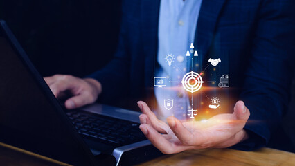 Hand shows the icon virtual screen of Digital target marketing advertising and sales increase business technology concept, online marketing, E-business, Ecommerce, Business online.