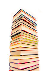 stack of books against a white background