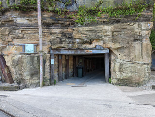 Dog leg tunnel carved out of the sandstone rock to allow easy access between two parts of the industrial precinct.at Cockatoo Island, Sydney, Australia. 