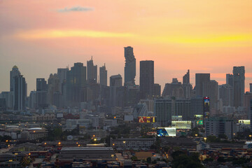 Aerial view of Bangkok Downtown Skyline, Thailand. Financial district and business centers in smart urban city in Asia. Skyscraper and high-rise buildings at sunset.