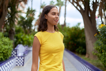 Young african american woman smiling confident looking to the side at park