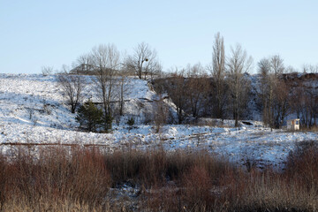 The hill covered with snow in winter