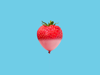 Strawberry balloon on bright blue background