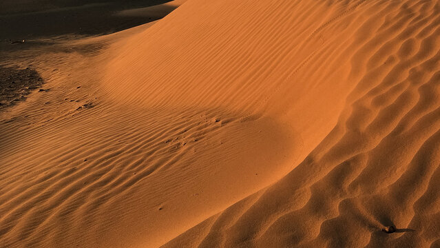 Landscape picture of Sahara desert dunes with blue sky