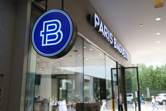 Shanghai,China-Sep.25th 2022: Paris Baguette store side view and logo. Korean bakery chain brand