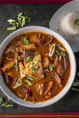 Sudado de Pescado, a traditional steamed fish stew from Peru served with rice.