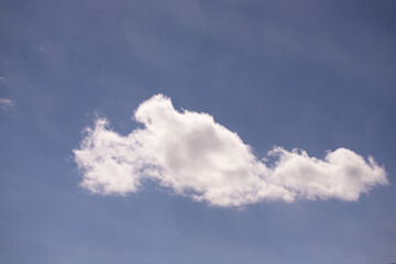 Obraz premium White clouds in the blue sky.