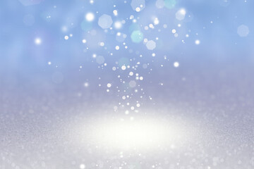 Abstract of Bright and sparkling bokeh background. silver and diamond dust bokeh - blurred lighting from glitter texture. Luxury design background.