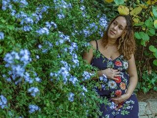 Pregnant Brazilian woman posing in the parks of Montjuic, Barcelona