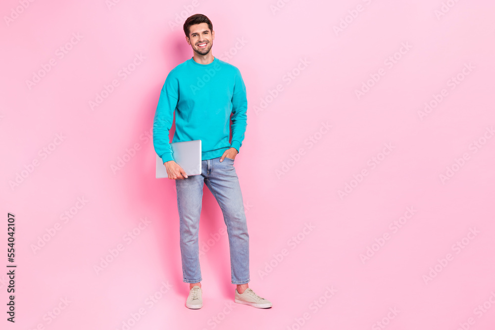 Poster Full size photo of attractive young man hold netbook success coder dressed stylish blue garment isolated on pink color background
