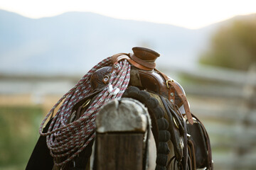 Western ranch saddle with rope