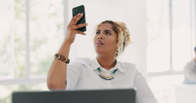 Phone, problem and angry black woman on office with technical glitch, error and network issue at work. Communication, technology and frustrated female worker with no service connection on smartphone