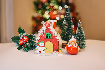 concept of the Christmas holiday. Christmas house and snowing background