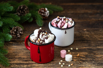 Cup of hot cocoa with marshmallows and chocolate. Traditional winter drink