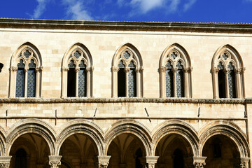 Fototapeta na wymiar Rector's palace porch and vaulted arcade with Renaissance styled individualized column capitals in the old town of Dubrovnik, Croatia 