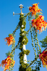 Maypole and a blue sky. Åland Islands, Finland