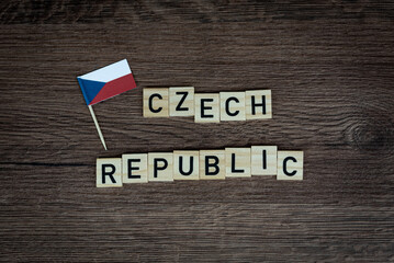 Fototapeta na wymiar Czech Republic - wooden word with czech flag (wooden letters, wooden sign)
