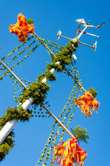 Maypole and a blue sky. Åland Islands, Finland