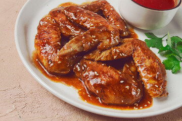 Chicken wings, with barbecue sauce, with tomato sauce, fast food, no people,