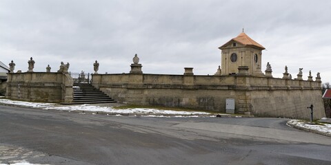 Fototapeta na wymiar Cemetery wall in winter. Strilky. Czechia. 