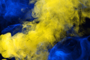 Yellow steam on a black background.