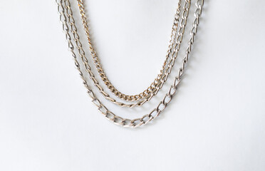 Group of silver and gold chain necklaces for feminine style ornaments and backgrounds