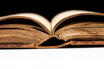 ancient book shot on black background