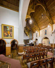 Fototapeta na wymiar Interior nave of the historic St. Matthew's Episcopal Cathedral in downtown Laramie, Wyoming