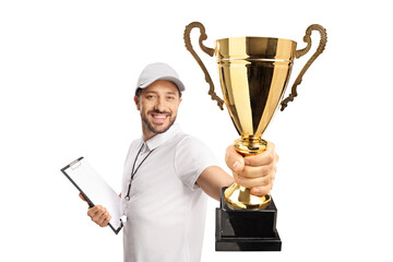 Sports coach winning a gold trophy cup - obrazy, fototapety, plakaty