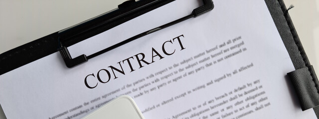 Contract agreement calculator and business financial profit closeup