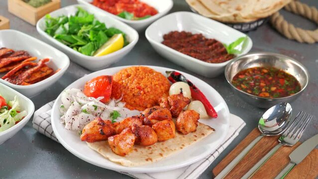 Traditional Turkish meal kebab, Ali nazik, adana kebap, urfa kebap, &ccedil;&ouml;p şiş, patlican kebap, domates kebap, şaşlık, saslik, ciger sis on table top view
