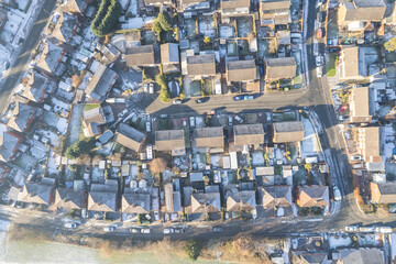 Fototapeta premium Aerial Houses Residential British England Drone Above View Summer Blue Sky Estate Agent. Snow, winter weather