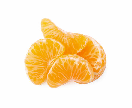 Pieces of fresh juicy tangerine on white background, top view