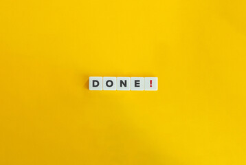 Done Word on Letter Tiles on Yellow Background. Minimal Aesthetics.