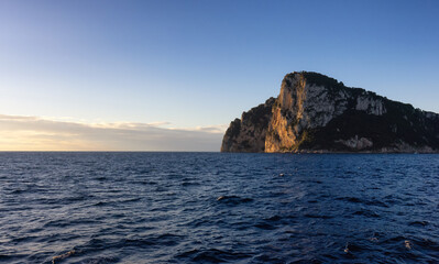 Capri Island in Bay of Naples, Italy. Sunny Sunrise Sky. Nature Background.