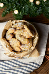 Traditional Christmas German and Australian cookies Vanillekipferl on a wooden background