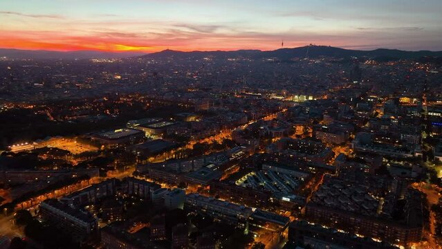 Aerial view of the Night Barcelona cityscape. Cityscape with typical urban octagon blocks. Catalonia, Spain