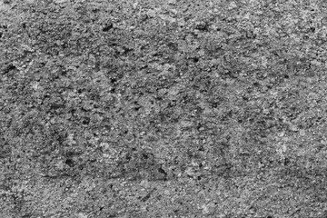 Stone brick texture. Hard surface. Abstract background. Black and white close-up photo