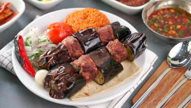 Traditional Turkish meal kebab, Ali nazik, adana kebap, urfa kebap, &ccedil;&ouml;p şiş, patlican kebap, domates kebap, şaşlık, saslik, ciger sis on table top view
