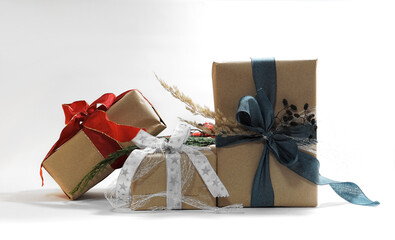 Christmas gifts from brown wrapping paper and with gift bow