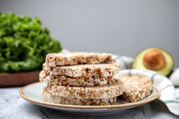 Stack of crunchy buckwheat cakes on table, closeup